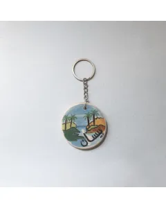 ميدالية خزفية يدوية – قطر 5 سم – فن الموزاييك